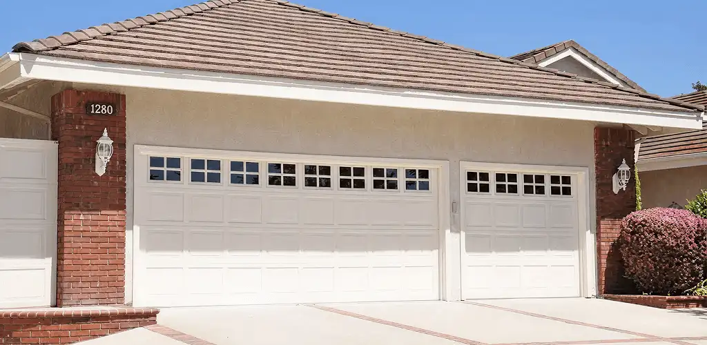 Residential garage door repair service for a double garage door in Albuquerque, NM