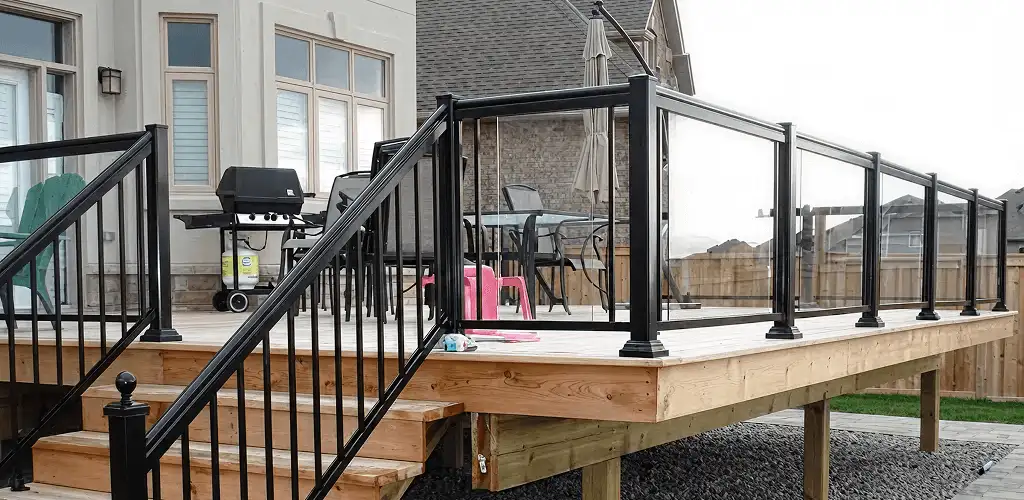 Handrail installation on a deck staircase for safety and code compliance in Albuquerque, NM
